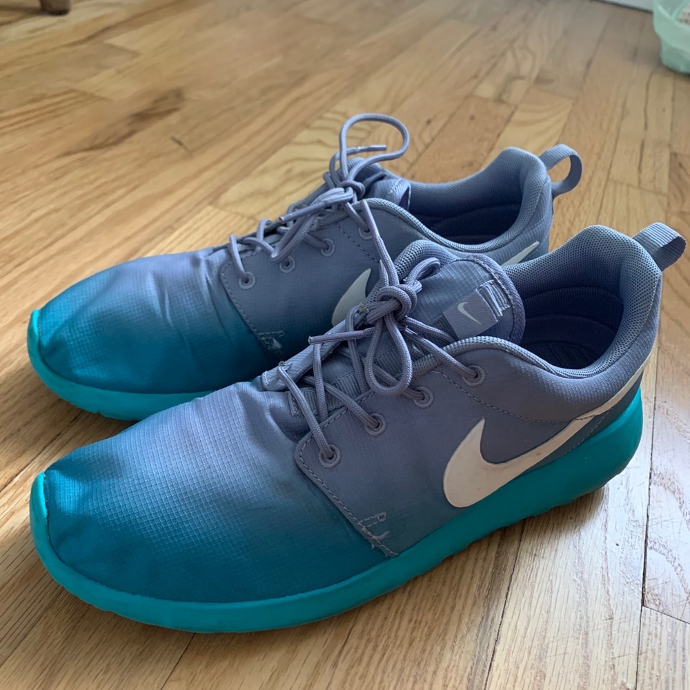 Blue and purple Nikes 7.5 w